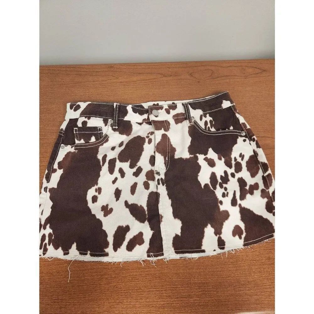 NWT No Boundaries Cow Print Raw Hem Denim Mini Skirt Women's size S (4-6) Cowgir
